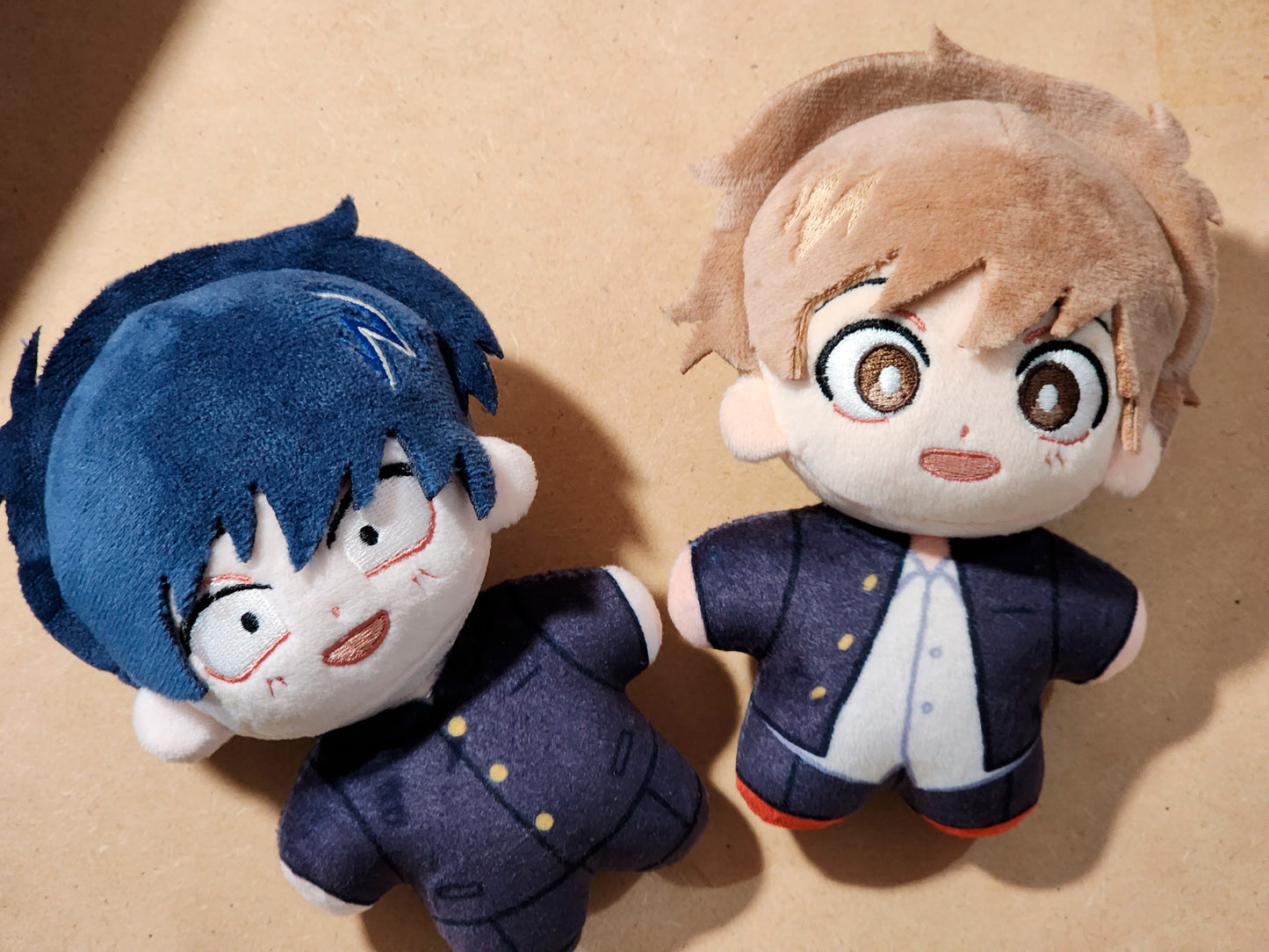 Nakamura and Hirose plushies